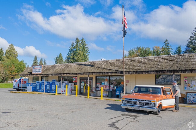 The Hobart Food Mart features a charming old gas pump and deli near Dorre Don.