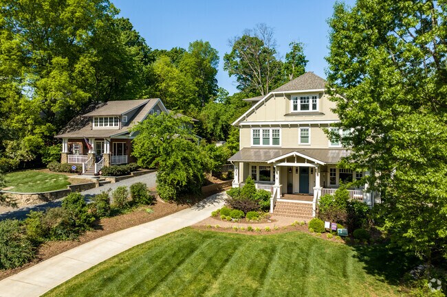 Homes in the Freedom Park neighborhood of Charlotte have well manicured lawns.