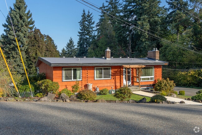 Single-story homes sit on slopes in Downtown Burien, such as this colorful one.