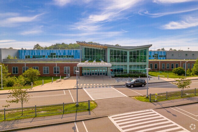 The main entrance of Falmouth Elementary School sports a modern look.