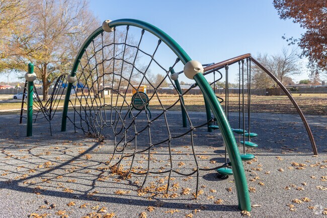 Kids will love the modern playground and climbing gear at Clark Park in Western Village.