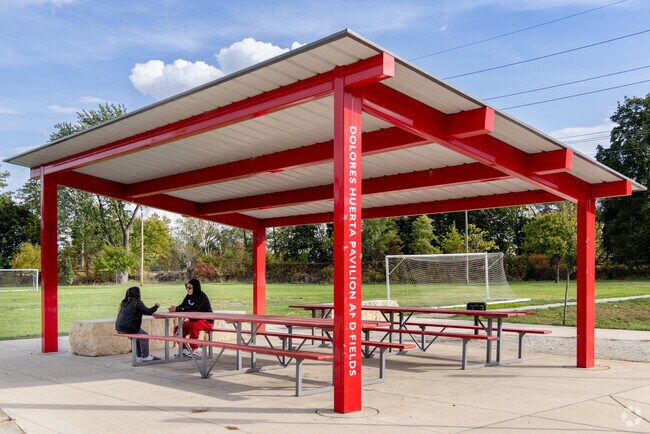 Pulaski Park includes a covered area with picnic tables to use on a nice day near LaSalle Park.