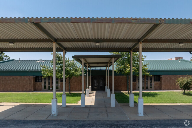Gateway Hubert Wheeler School has an entrance point behind a fence for security.