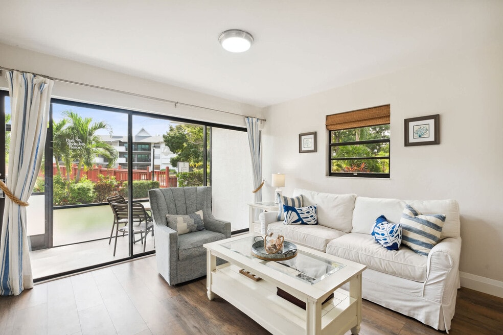 600 Neapolitan Way unit FL1-ID1073539P, Naples, FL 34103 - photo 1