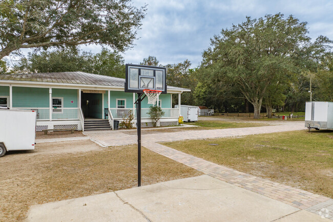 Kids enjoy outdoor play on the sports courts at Learning Gate Community School.