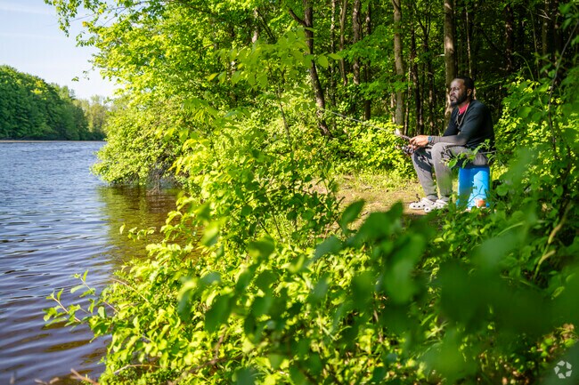 Lansing-Eaton locals head to the Grand River for fishing after a day of work.