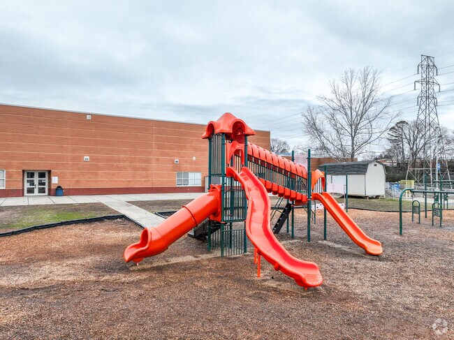 Kids enjoy the playground at Winecoff Elementary.