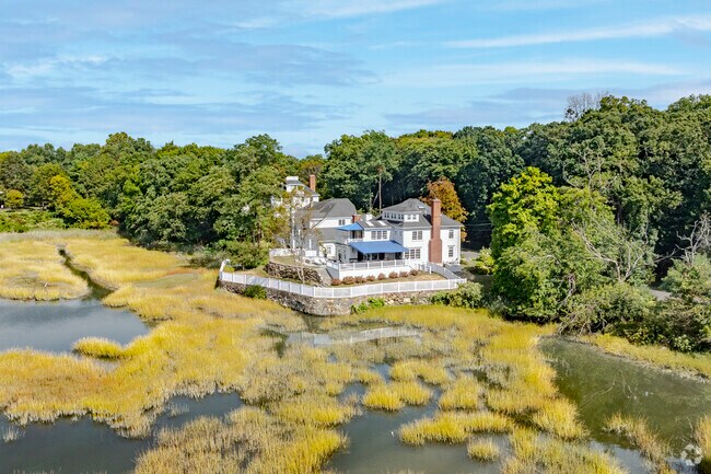 A home perched on the marsh side of Vista Drive in Downtown Greenwich has views of the sunset.