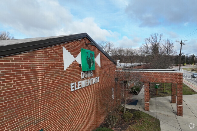 The jumping dragon is the mascot of Dorr Street Elementary School.