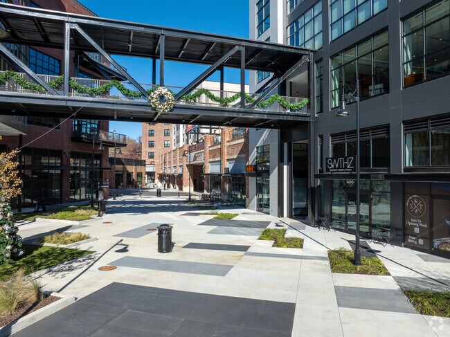 Here is a great example of shopping next to business as well living spaces.