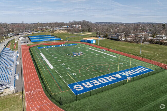 The Highlanders mascot shows proudly at Williston Park Herricks High School football field.
