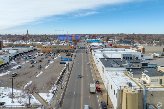 Aerial view of retail stores and local businesses along West Broadway Avenue in Minneapolis.