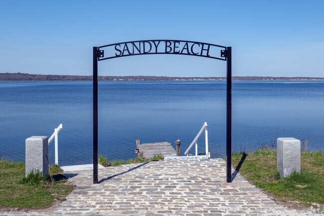 Sandy Beach is anchored by the shoreline of the Taunton River and Mount Hope Bay.