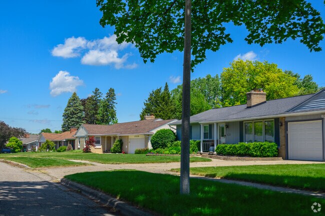 A row of ranch homes grace a tree-lined street in Edgemont Park.
