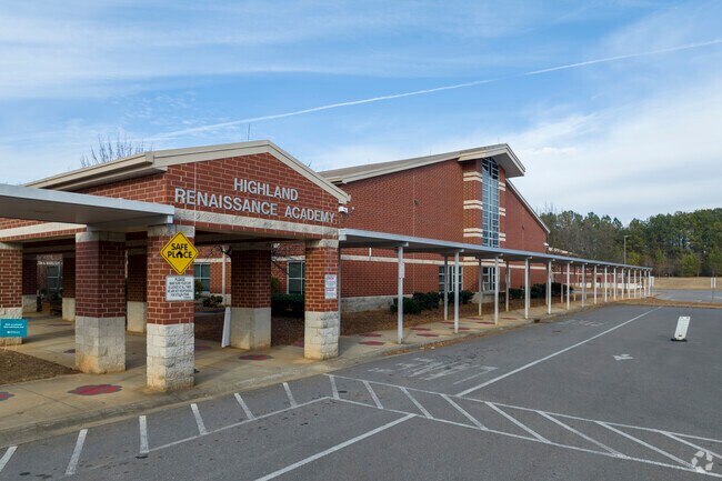 Highland Renaissance Academy main building and drop off.