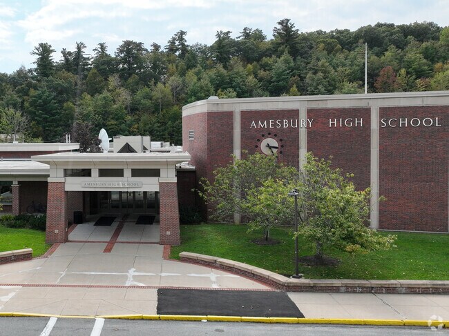 The school colors of Amesbury High School, in Amesbury, are red and white.