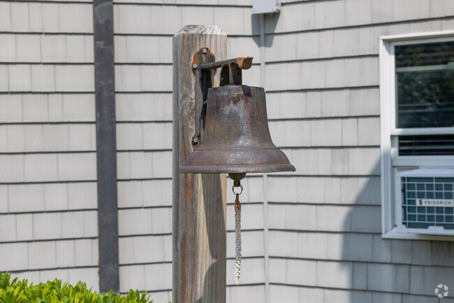 A charming bell sits outside the entrance of Stony Brook Elementary in Brewster.