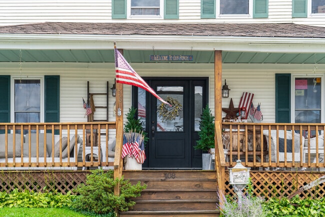 Neighbors in Larksville enjoy their front porches on warm summer days.