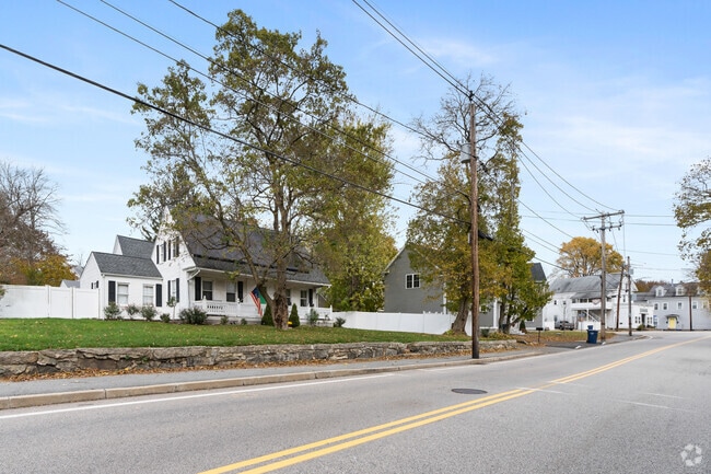 On Rt 109 in West Medway, diverse two-story homes feature a range of architectural styles.