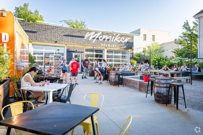 Immerse yourself in food, drinks, and artistry at Juicy Market PVD, in Moniker Brewery, RI.