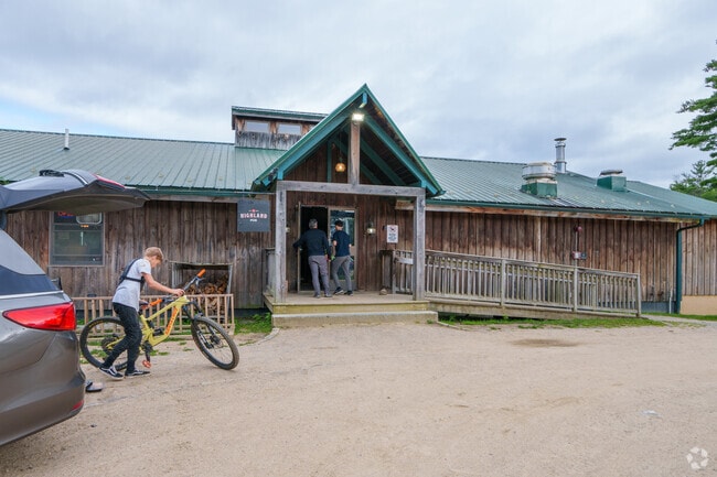 After a fun day on the trails, riders enjoy hanging at the Highland Mountain Pub in Northfield.