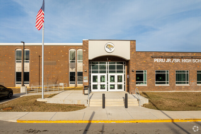 Peru High School has 883 students.