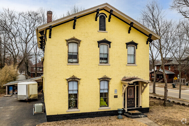 A Colonial-style home featuring a gable roof in Dover, Ohio.