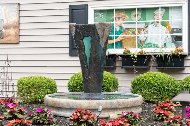 Cozy's Cafe serves American favorites with craft beer and weekend music.