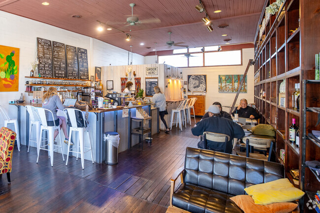 Locals gather at THe Wild Root Coffee shop in downtown Lynn Haven.