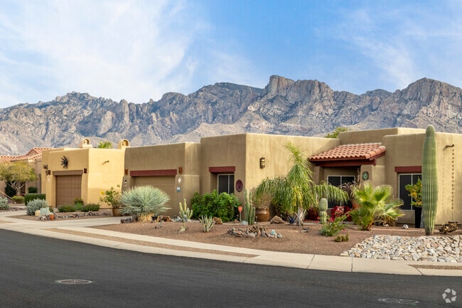 Pueblo-inspired homes can be found in Oro Valley subdivisions with mountain views.