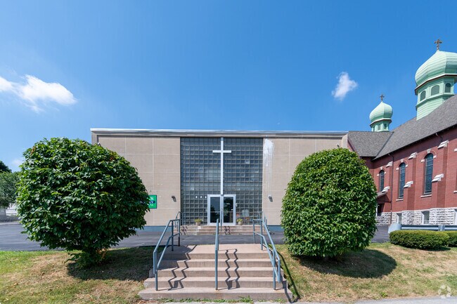 The front entrance welcomes students to All Saints Elementary Of Tipperary Hill in Westside.