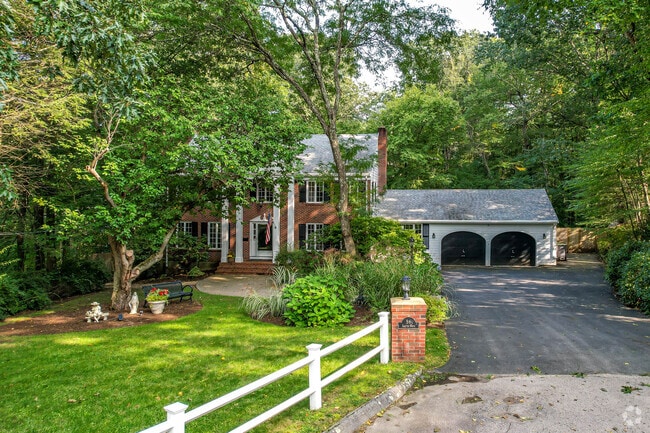 Homes in Riverdale include colonial homes with large driveway space and garage.