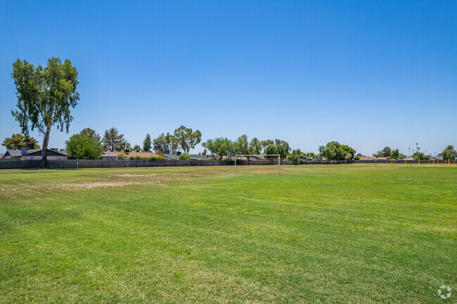 Enjoy outdoor activities on the open field at Tumbleweed Elementary School in Phoenix.