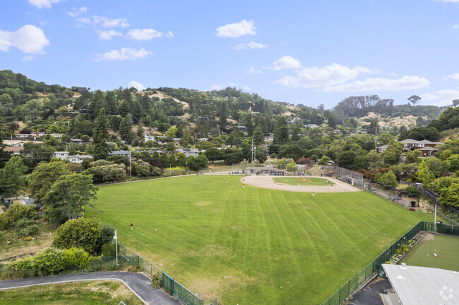 Practice baseball or tee ball with your little one at Edna Maguire Elementary School.