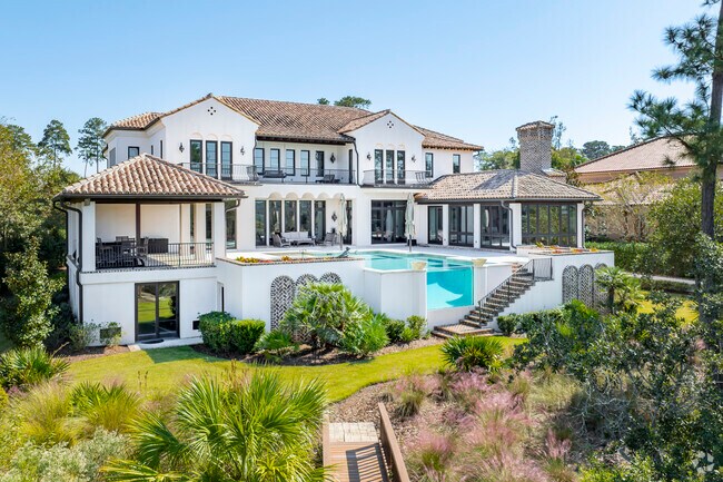 Custom designed oasis overlook private water access in Berkley Hall.