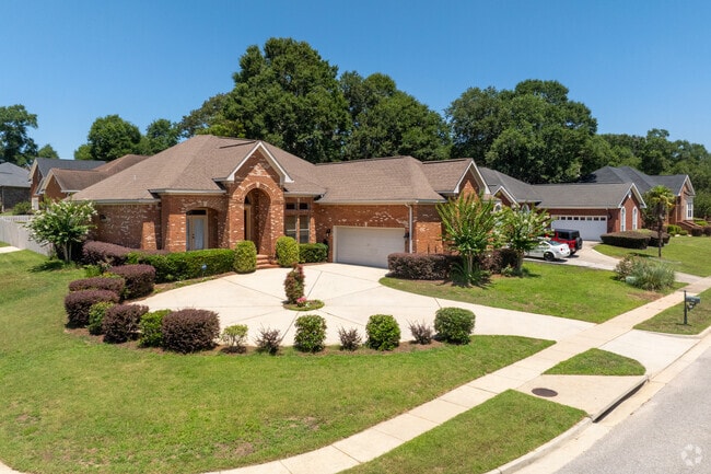 Beautiful brick homes with multiple gables and fancy landscaping can be found in Fairview.