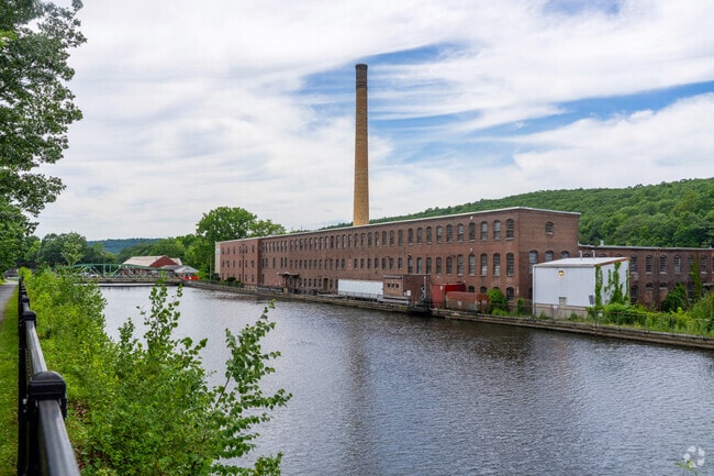 The abandoned paper mills along the Canalside Rail Trail in Turners Falls reflect the area’s rich industrial history.