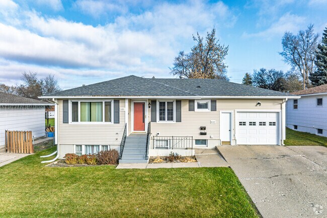 Some homes in Park Hill have driveways, street parking, and plenty of space to grow.