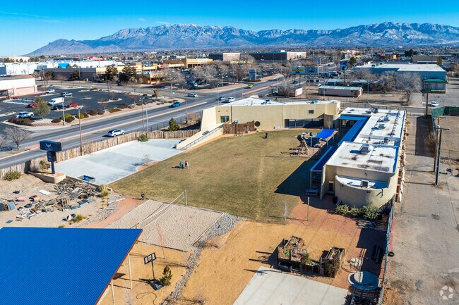 Acton Academy Albuquerque and the Sandia Mountains in the distance.