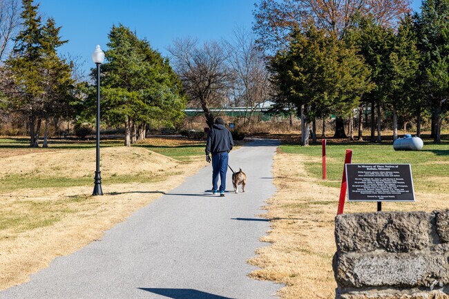 Buffalo residents can enjoy a sunny stroll on a paved trail in the Dallas Community Park.