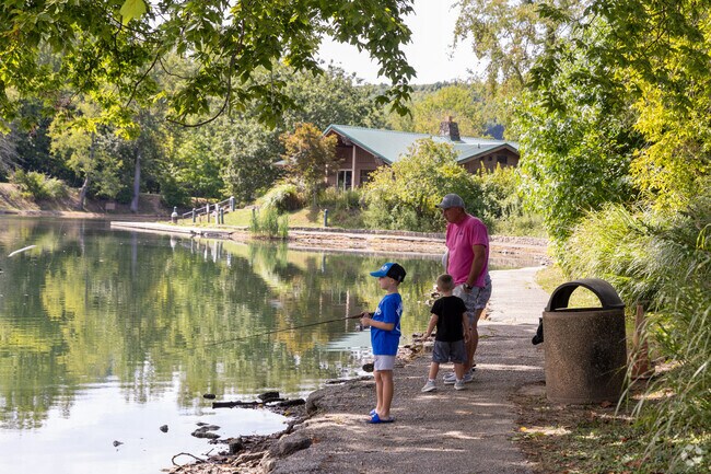A Big Chimney family enjoys a fishing trip together.