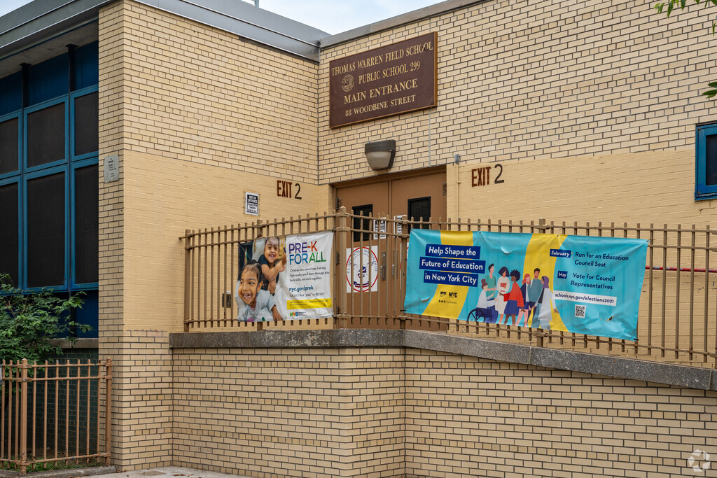 Main entrance to PS 299 Thomas Warren Field School located on Evergreen Ave.