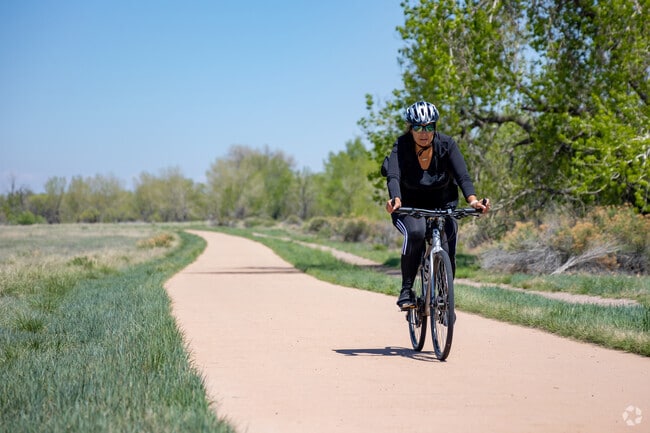 Arapaho Bend Natural Area, near Dakota Ridge, offers trails, fishing, and sunset views.