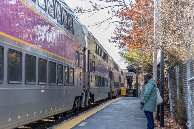 Commuters in Dedham Village use the T at the Dedham Corporate Center.