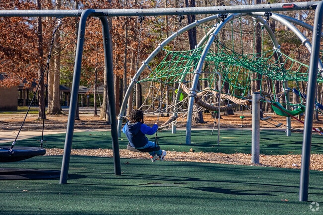 Kids enjoy climbing and sliding at the Dorey Park Playground in Sandston.