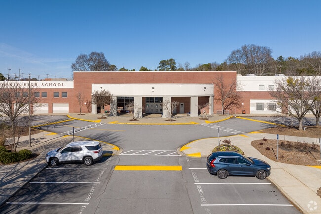 Phoenix High School and having smaller classes and an open campus for its students.