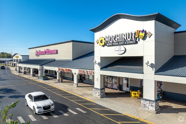 Strip malls host an array of casual spots like Panda World for Chinese takeout & BubbaQue's.