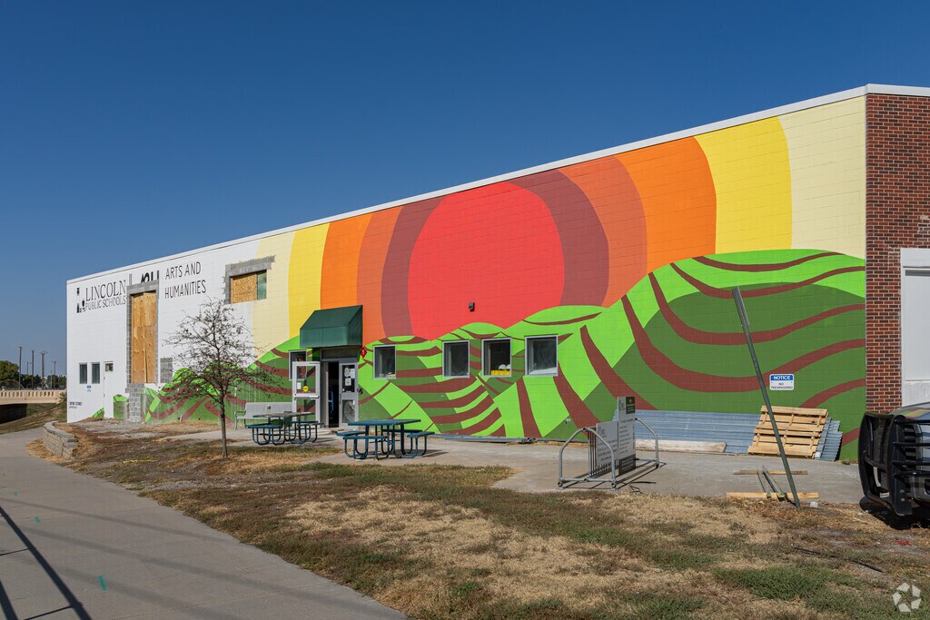 A giant mural highlights the main building at the Arts & Humanities Focus Program.