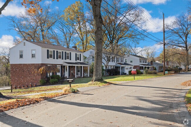 This home in Leet Township is a Colonial-style duplex, marked by its symmetrical façade, shuttered windows, and simple, traditional lines that echo classic American suburban design.