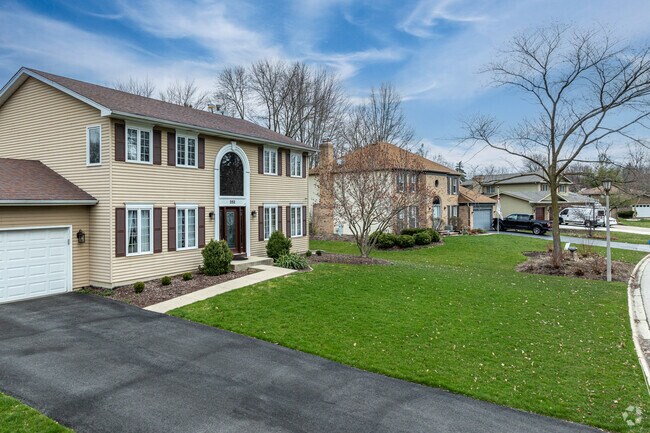 Winston Woods features pampered lawns with neatly trimmed hedges.